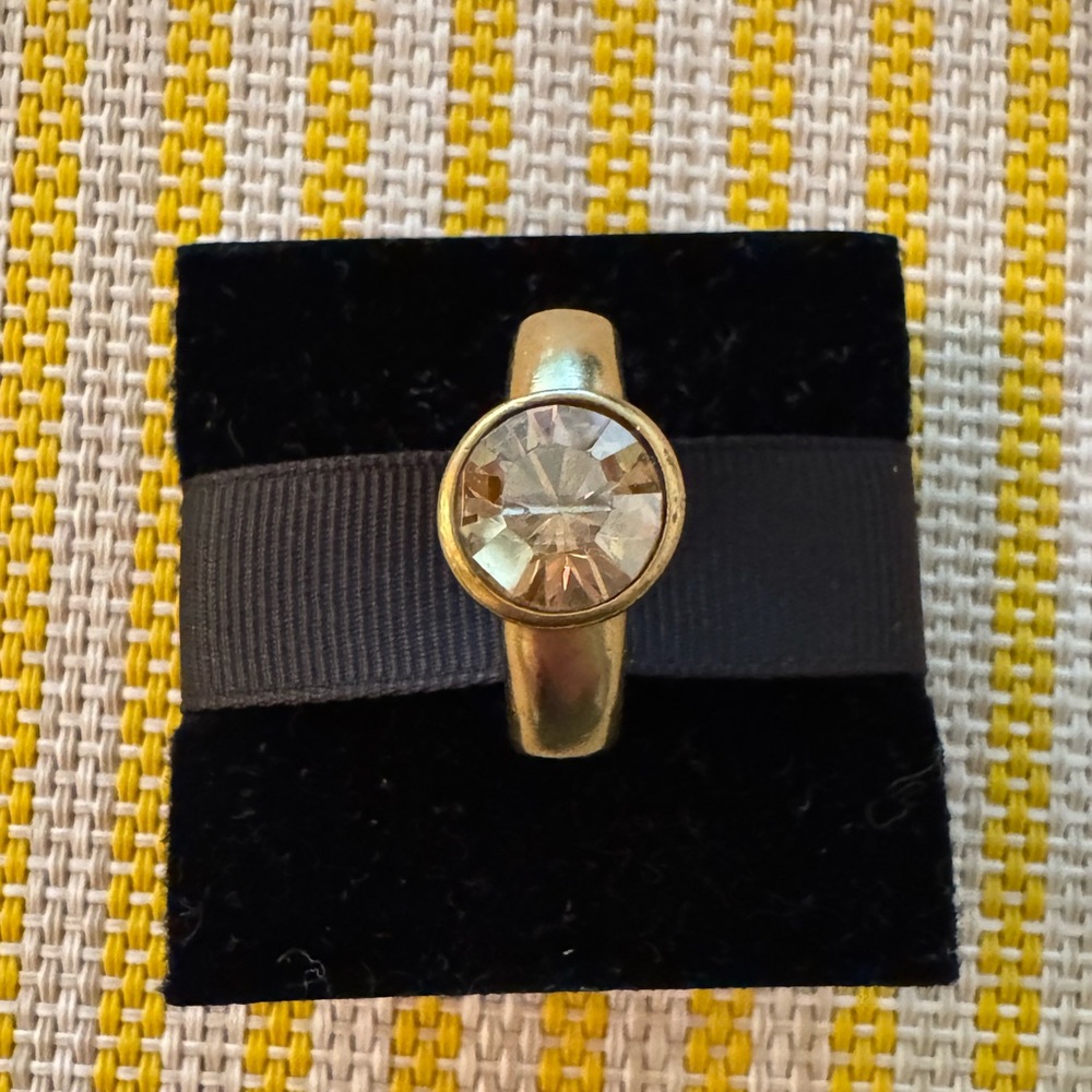 Elegant Gold-Tone Ring with Clear Gemstone